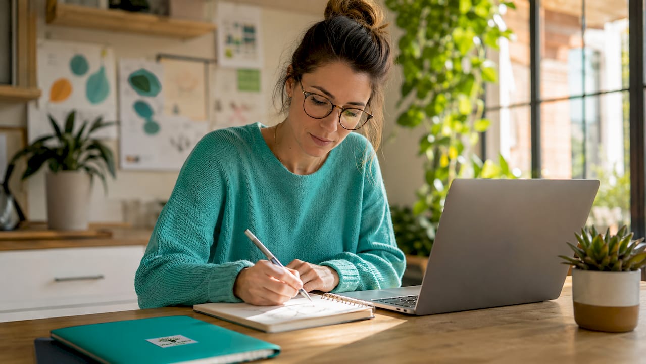 1782529581199_Woman-designing-website-in-home-office Woman designing website in home office