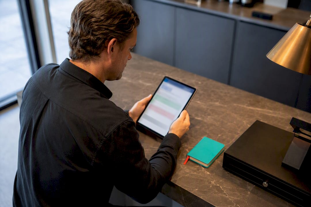 1789587320662_Australian-business-owner-reviewing-account-access Australian business owner reviewing account access